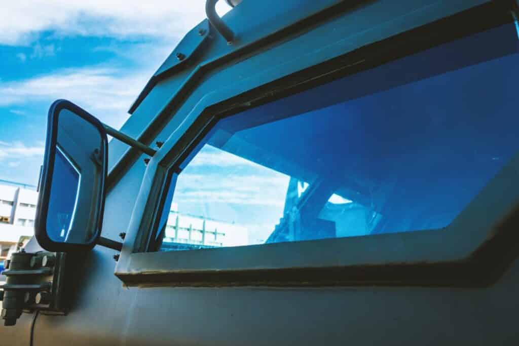 an armored vehicle with a bulletproof glass window