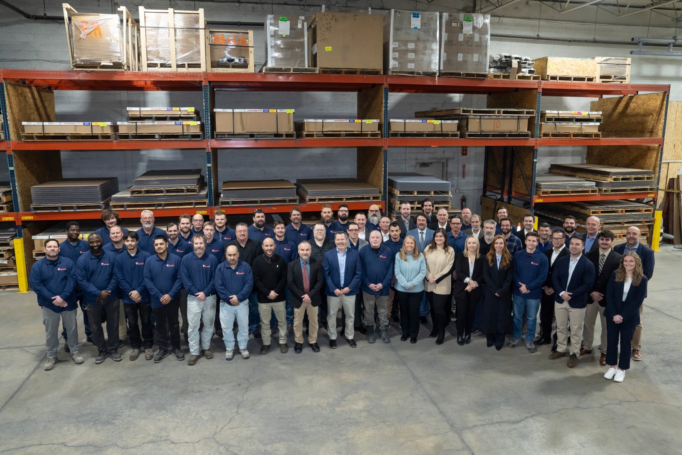 Insulgard staff standing together in warehouse