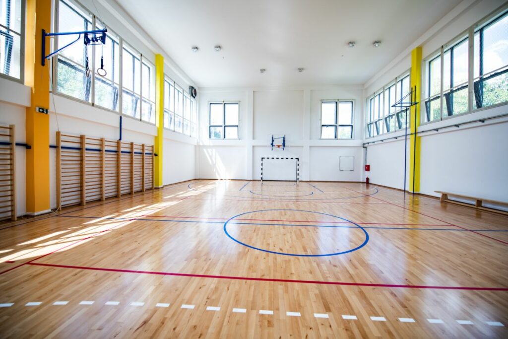 the inside of a school gymnasium that could be used as a community safe room