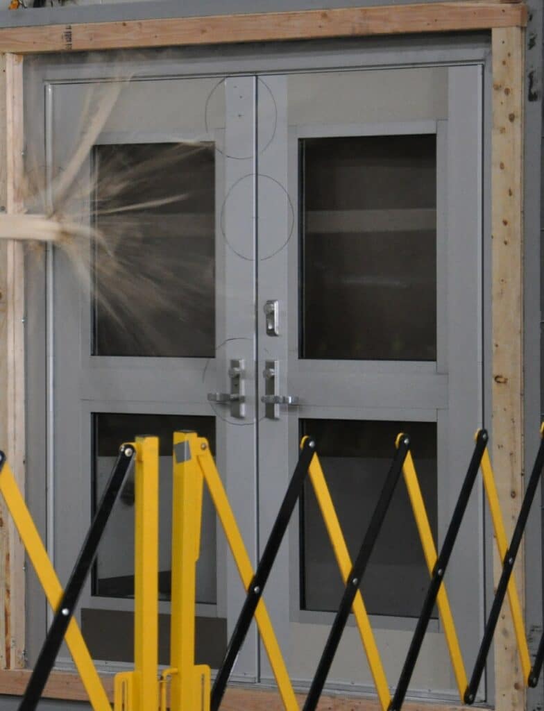 Insulgard Security Products™ STORMDEFEND™ TTH350 Door system undergoing Debris Impact testing.